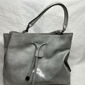 Alberta Di Canio Italian Leather Bag , In The Color Gray With Metal Accent .